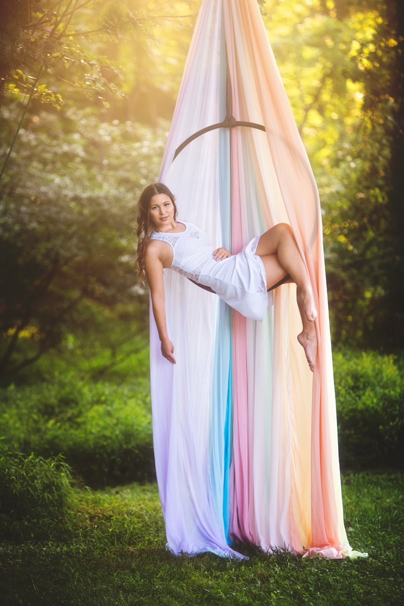 Portrait Photographer, girl lounging inside an acrobat's hoop