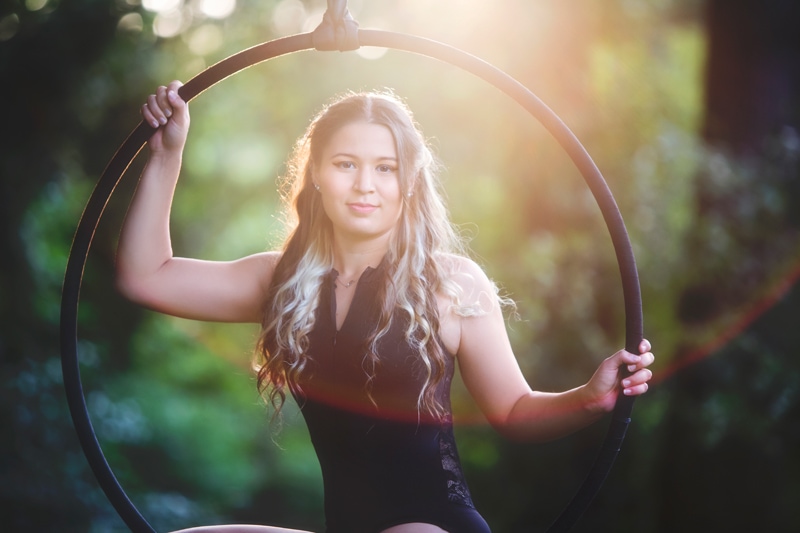 Portrait Photographer, girl balancing in acrobat hoop
